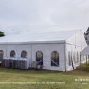 Outdoor White Aluminium Wedding Marquee Tent Set Up On Grass