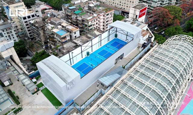 Electric push-pull peak court on city rooftop - open position