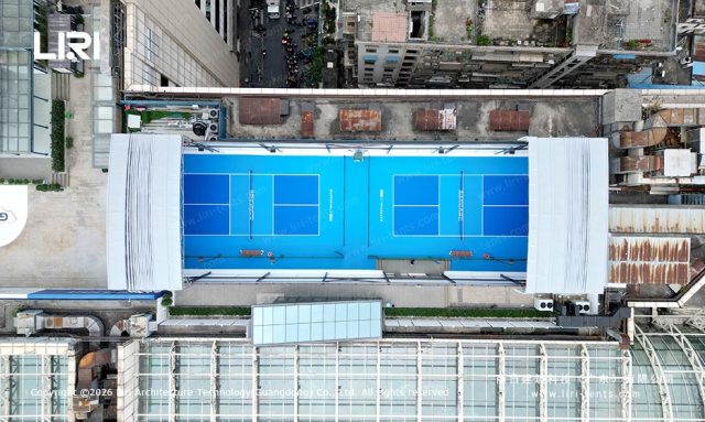 Electric sliding peak stadium on a city rooftop - aerial photography