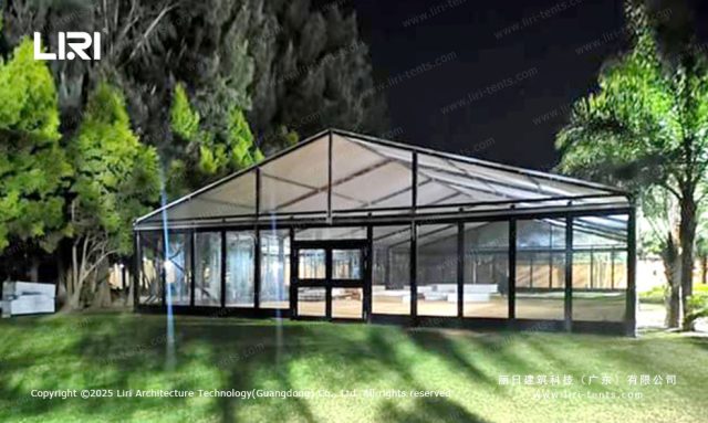 Panoramic Glass Wall Event Marquee at Night