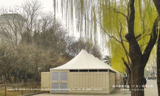 Weatherproof temporary toilet marquee with hard wall panels