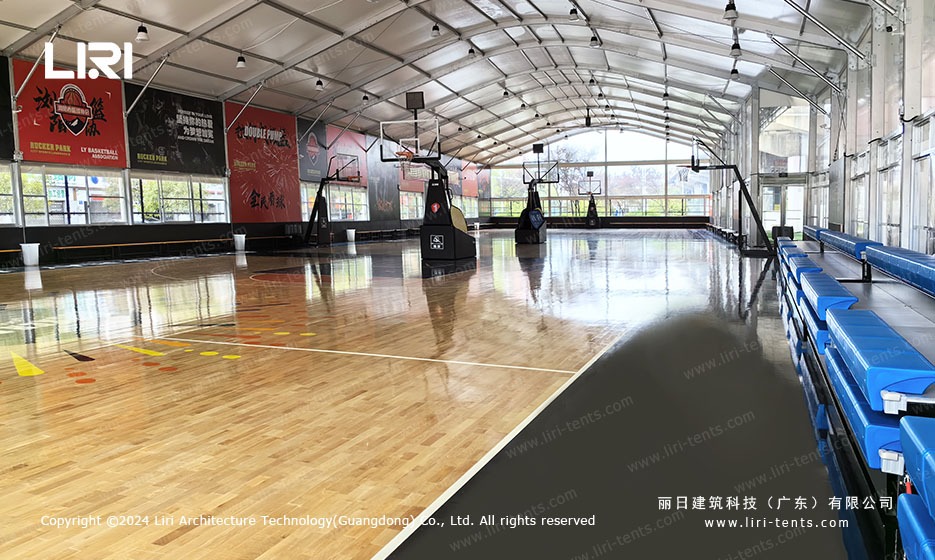 commercial sport marquee with side seating and basketball equipment