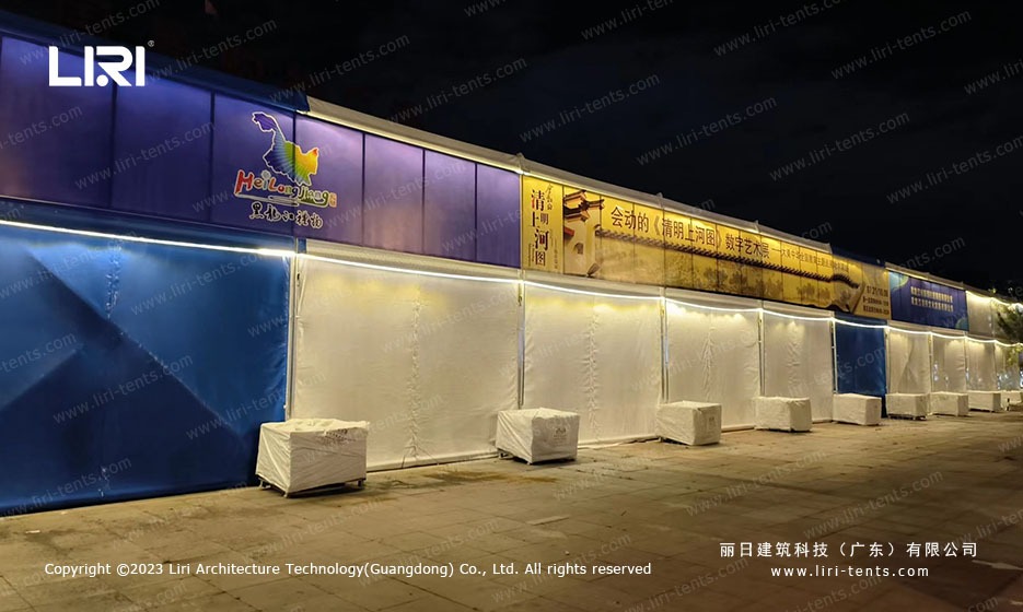 Qingming exhibition tent at night with external banner and lighting