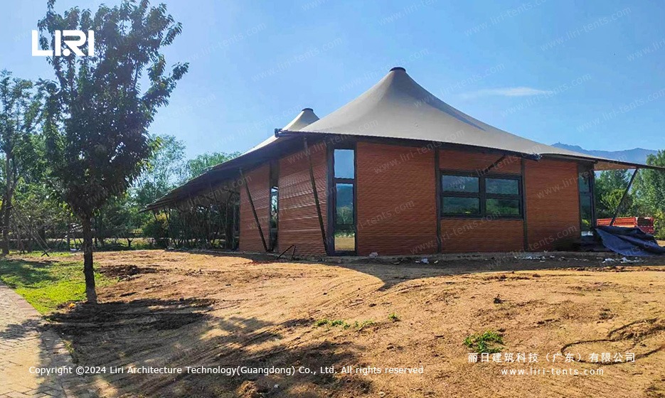 Wood and glass exterior of tension membrane tent