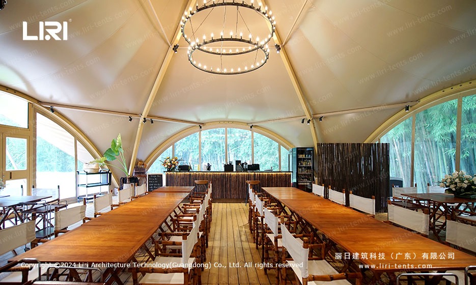Banquet and bar setup inside safari marquee tent