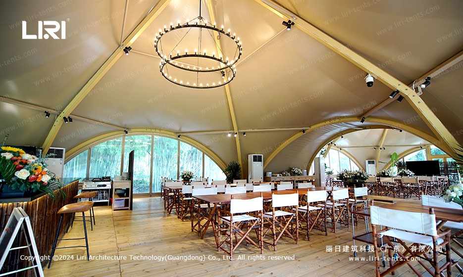 Luxury dining hall interior under tension membrane marquee
