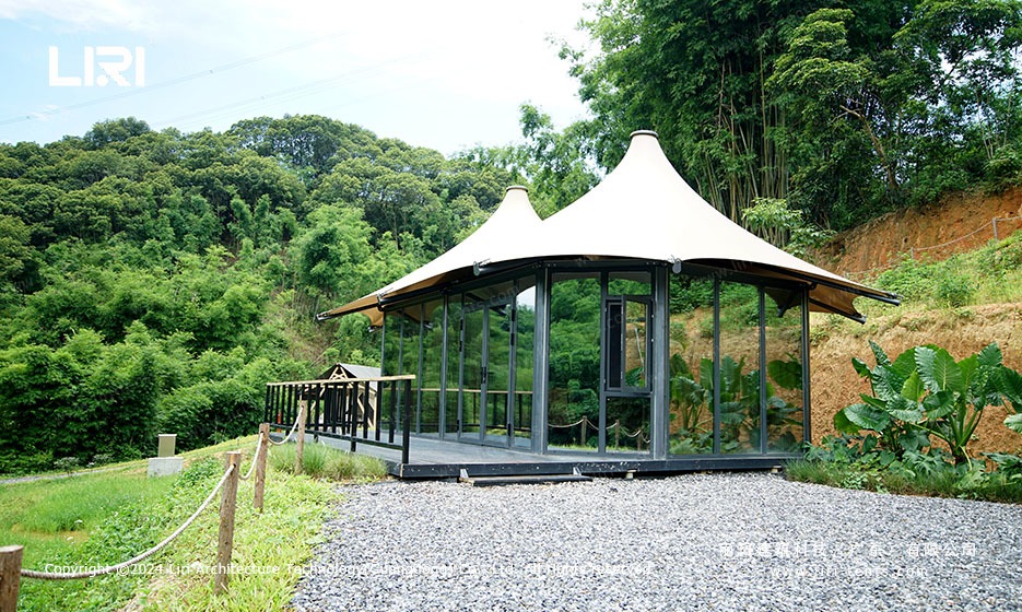 Forest resort lodge with twin peak tension membrane roof
