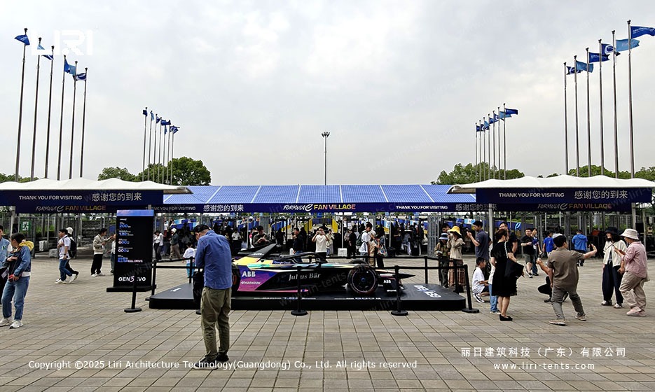 Fan Village A-frame marquee tent with Formula E show car on display platform at the Shanghai E-Prix