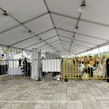 Security checkpoint interior of clear span marquee tent with high ceiling at the 2025 Shanghai E-Prix