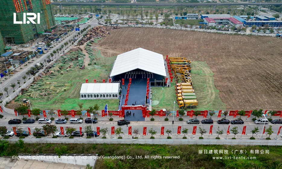 industrial park project display boards inside outdoor event marquee