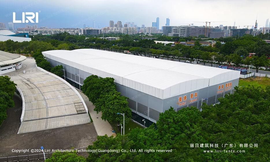 Outdoor tennis court marquee cover installed over multi-court complex