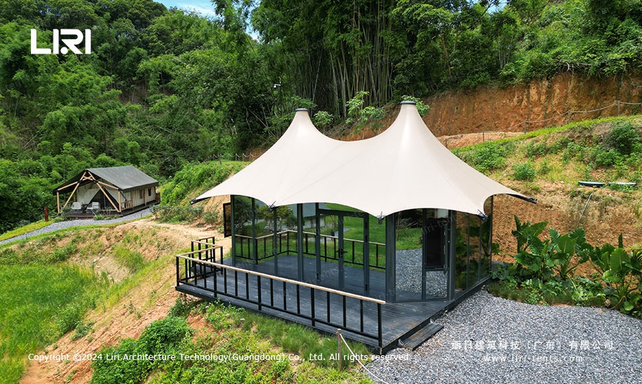 Safari lodge tension membrane tent exterior with glass walls