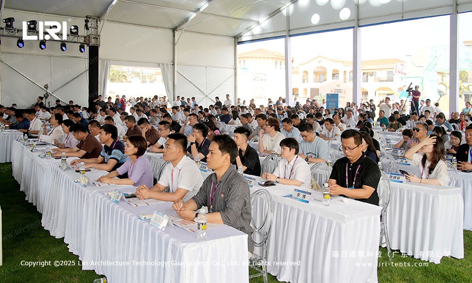 Clear span event marquee tent interior seating rows at coffee festival