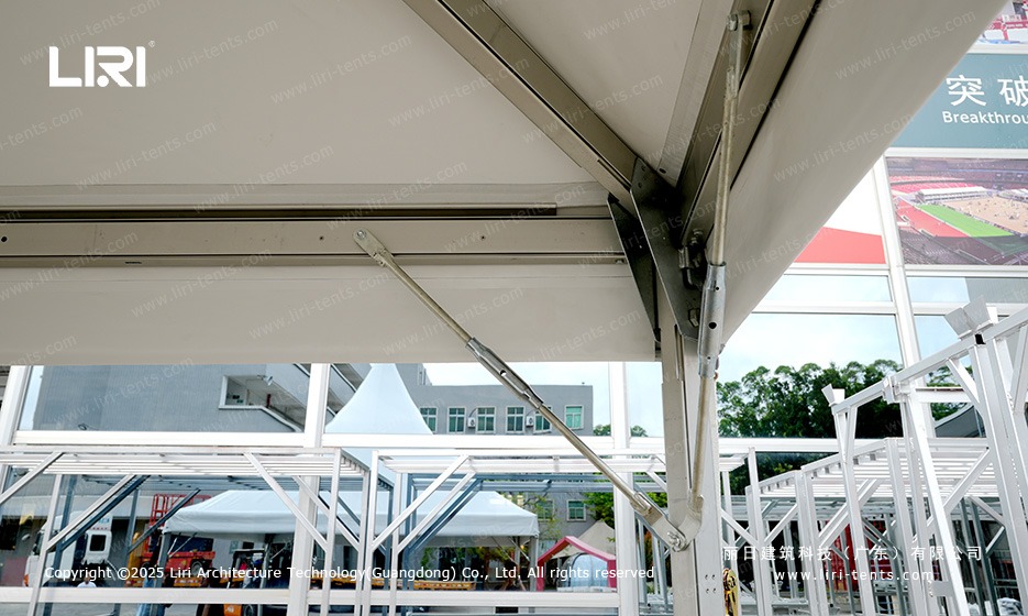 White pagoda tent side profile showing high peak roofline