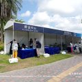Race circuit accreditation center marquee tent with dual peaked roof for staff check-in