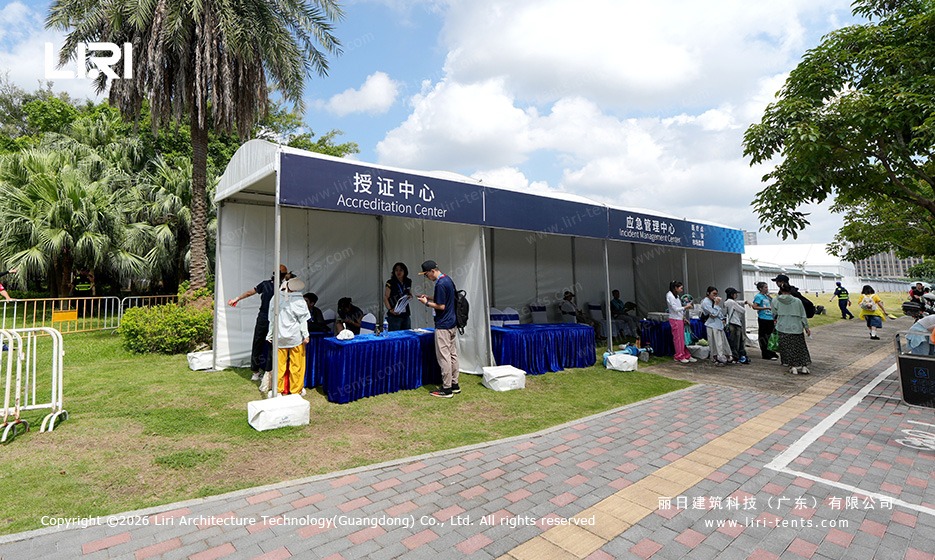 Race circuit accreditation center marquee tent with dual peaked roof for staff check-in